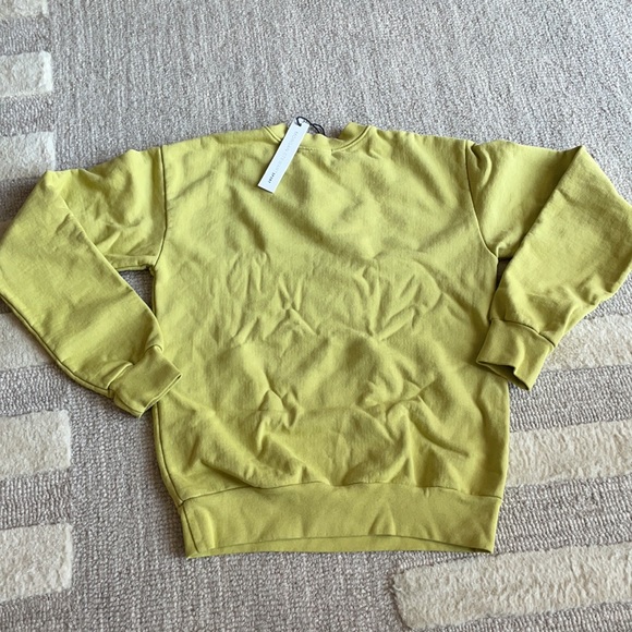Sweatshirt in Lemon Lime
Morgan Stewart Sport XS - Picture 8 of 8